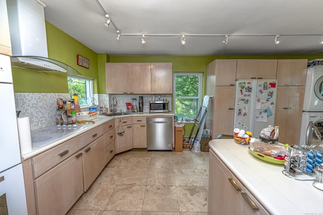 272 Saint John St, New Haven, CT 06511 - kitchen featuring estacked washer and dryer, light brown cabinetry, and appliances with stainless steel finishes