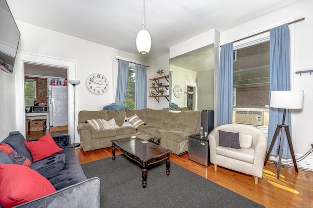 272 Saint John St, New Haven, CT 06511 - living area featuring wood finished floors and cooling unit