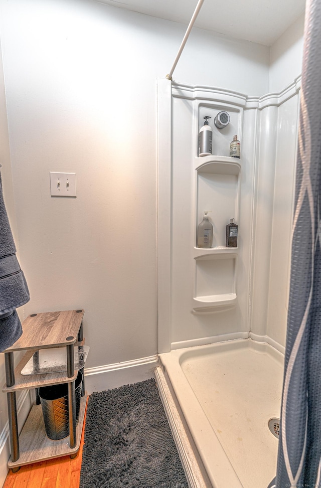 272 Saint John St, New Haven, CT 06511 - bathroom featuring a shower stall and wood finished floors