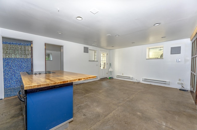 272 Saint John St, New Haven, CT 06511 - kitchen featuring butcher block countertops, baseboard heating, concrete floors, and recessed lighting