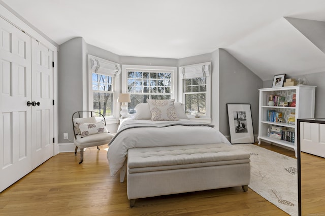 634 Nod Hill Rd, Wilton, CT 06897 - bedroom with wood finished floors, a closet, and lofted ceiling