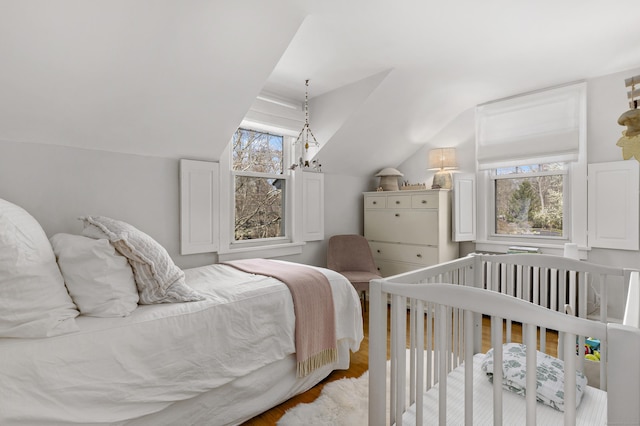 634 Nod Hill Rd, Wilton, CT 06897 - bedroom with vaulted ceiling and wood finished floors