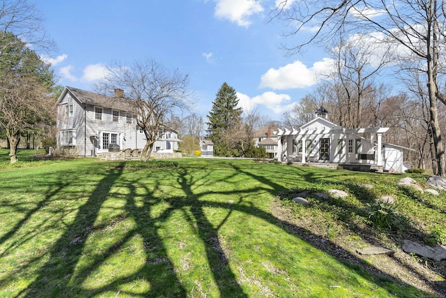 634 Nod Hill Rd, Wilton, CT 06897 - view of green lawn with a pergola and a patio area