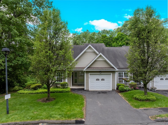 153 Louis Hill Rd Unit 153, Newtown, CT 06482 - view of front of house featuring a garage, driveway, a front lawn, and roof with shingles