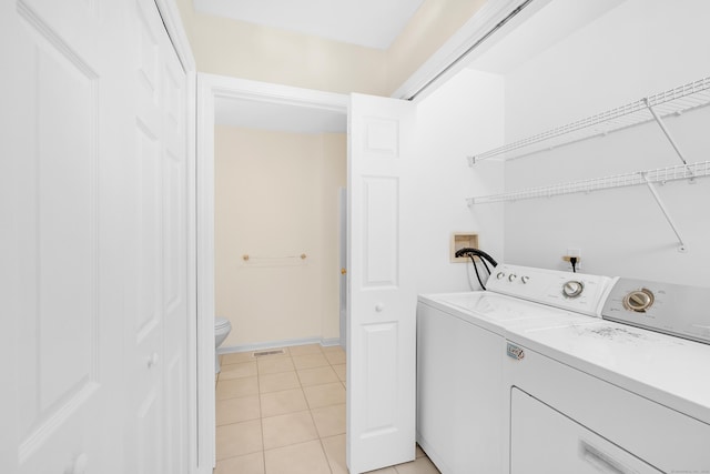153 Louis Hill Rd Unit 153, Newtown, CT 06482 - washroom featuring independent washer and dryer and light tile patterned floors