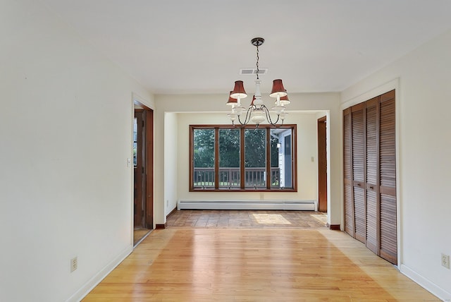 134 Millard St, Fairfield, CT 06824 - unfurnished dining area with a baseboard radiator, a chandelier, and light wood-type flooring