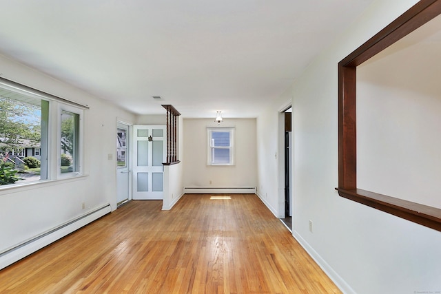 134 Millard St, Fairfield, CT 06824 - unfurnished room featuring baseboard heating and light wood-style floors