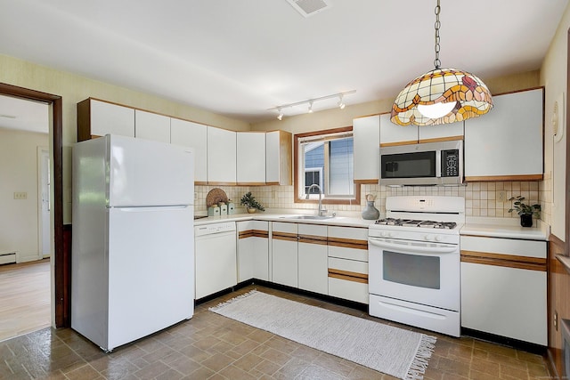 134 Millard St, Fairfield, CT 06824 - kitchen featuring white appliances, light countertops, and white cabinets