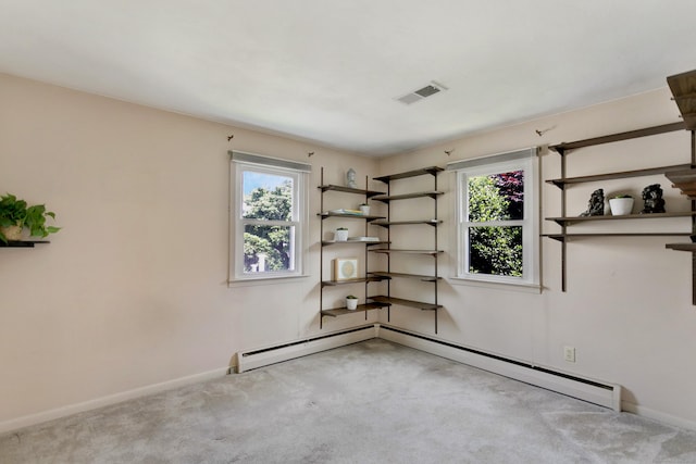 134 Millard St, Fairfield, CT 06824 - empty room featuring carpet, a baseboard radiator, and healthy amount of natural light