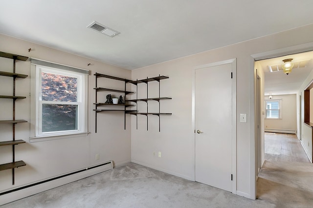 134 Millard St, Fairfield, CT 06824 - unfurnished bedroom featuring baseboard heating and light carpet