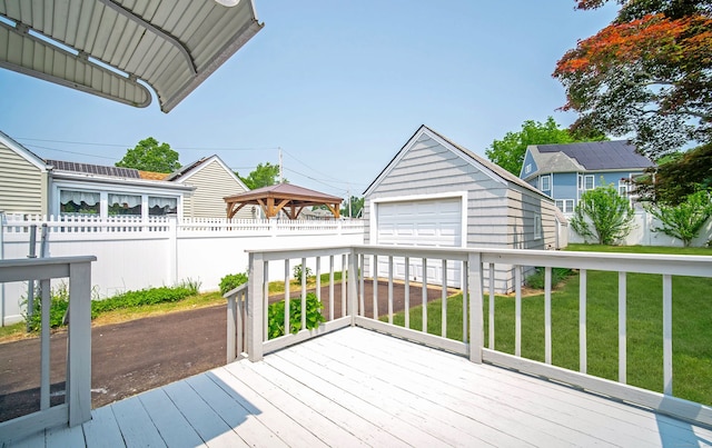 103 Saltonstall Pkwy, East Haven, CT 06512 - wooden deck with an outdoor structure, a detached garage, and a gazebo