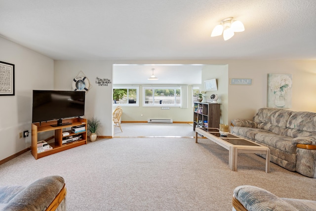 81 Standish Rd, Coventry, CT 06238 - living area featuring a baseboard heating unit and carpet flooring