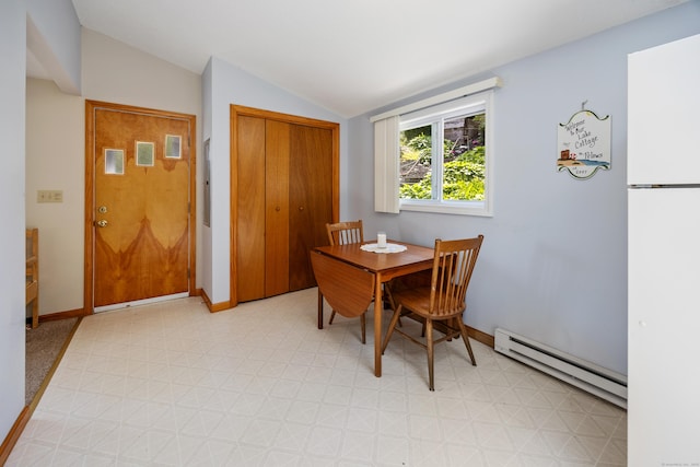 81 Standish Rd, Coventry, CT 06238 - dining room with a baseboard radiator, lofted ceiling, and light flooring