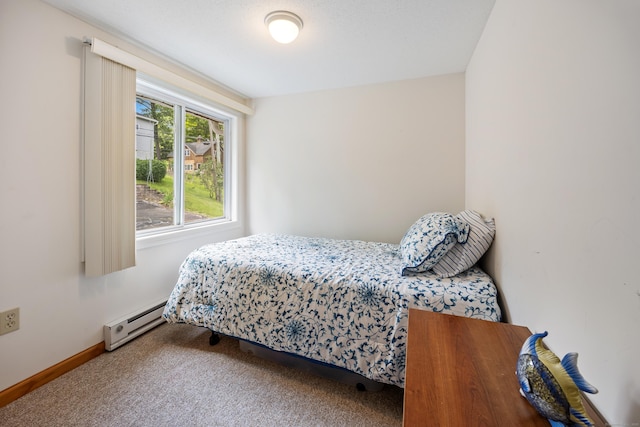 81 Standish Rd, Coventry, CT 06238 - carpeted bedroom featuring baseboard heating and baseboards