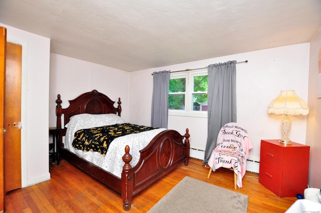 9 Eleanor Rd, Enfield, CT 06082 - bedroom featuring light wood-type flooring and a baseboard radiator
