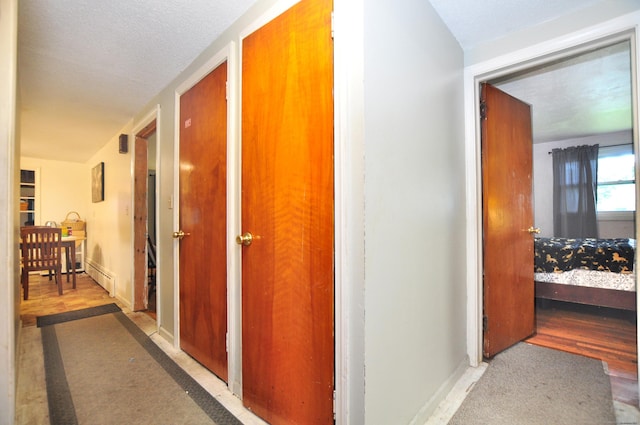 9 Eleanor Rd, Enfield, CT 06082 - corridor featuring wood finished floors