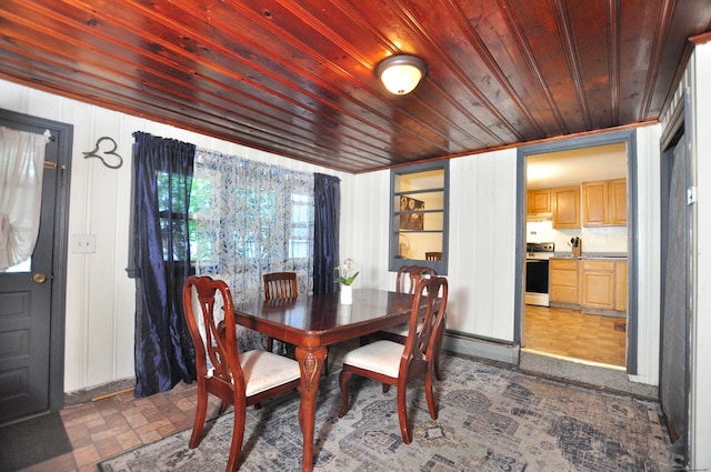 9 Eleanor Rd, Enfield, CT 06082 - dining space featuring wood ceiling and brick patterned flooring