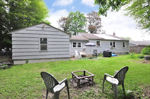 9 Eleanor Rd, Enfield, CT 06082 - back of house with a chimney