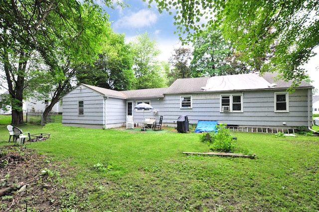 9 Eleanor Rd, Enfield, CT 06082 - back of property with a yard and cooling unit
