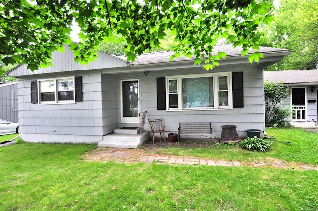 9 Eleanor Rd, Enfield, CT 06082 - view of front facade featuring a front yard