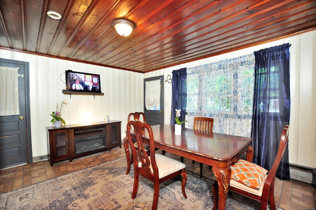 9 Eleanor Rd, Enfield, CT 06082 - dining room featuring wood ceiling, brick patterned floors, and baseboard heating