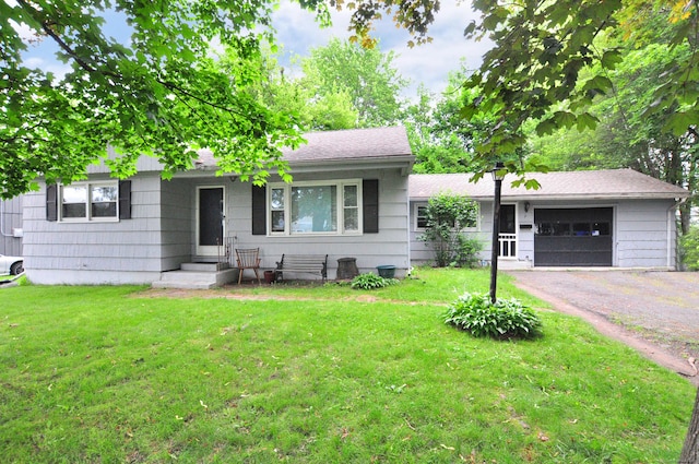 9 Eleanor Rd, Enfield, CT 06082 - ranch-style house featuring an attached garage, asphalt driveway, and a front yard