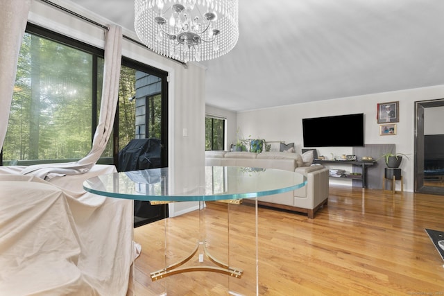 67 Woodside Cir Unit 67, Torrington, CT 06790 - dining room featuring wood finished floors and a chandelier