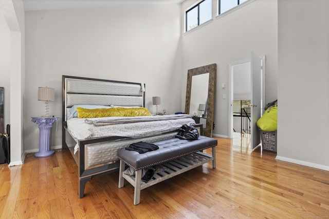 67 Woodside Cir Unit 67, Torrington, CT 06790 - bedroom featuring a towering ceiling and light wood-style floors