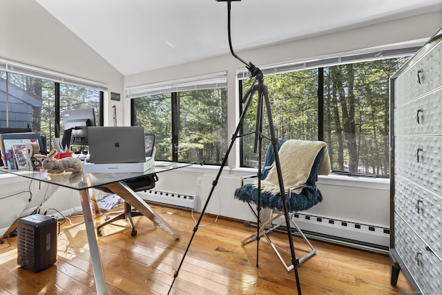 67 Woodside Cir Unit 67, Torrington, CT 06790 - home office with lofted ceiling, wood finished floors, and a baseboard radiator