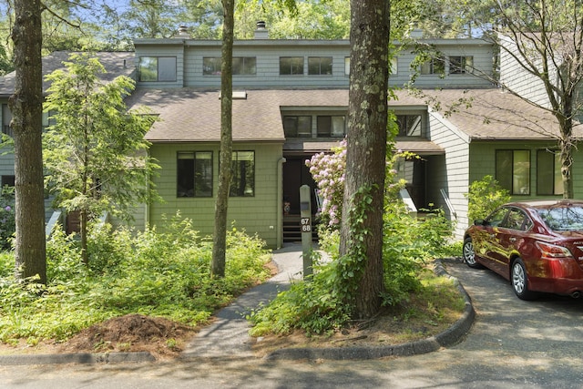 67 Woodside Cir Unit 67, Torrington, CT 06790 - view of front facade with roof with shingles and a chimney