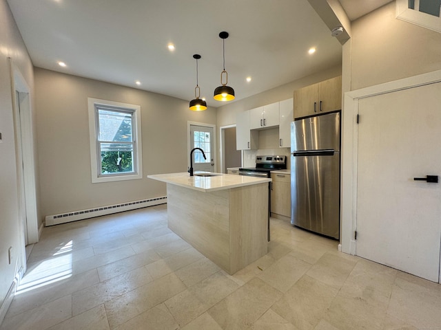 21 Garibaldi St, Watertown, CT 06779 - kitchen with stainless steel appliances, a baseboard heating unit, recessed lighting, a center island with sink, and light countertops