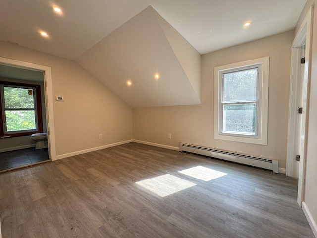 21 Garibaldi St, Watertown, CT 06779 - bonus room featuring baseboard heating, wood finished floors, vaulted ceiling, and recessed lighting