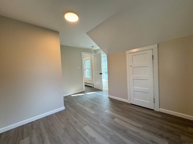 21 Garibaldi St, Watertown, CT 06779 - unfurnished room featuring wood finished floors and baseboard heating