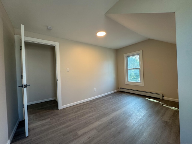 21 Garibaldi St, Watertown, CT 06779 - empty room featuring a baseboard heating unit, dark wood-style flooring, a smoke detector, lofted ceiling, and recessed lighting