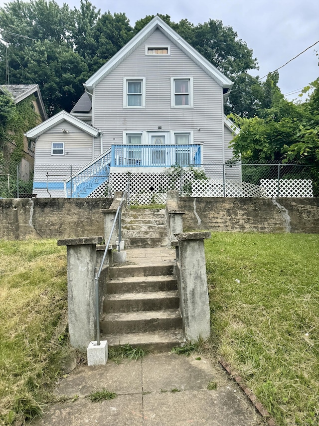 81 Easton Ave, Waterbury, CT 06704 - back of property featuring a wooden deck and stairs