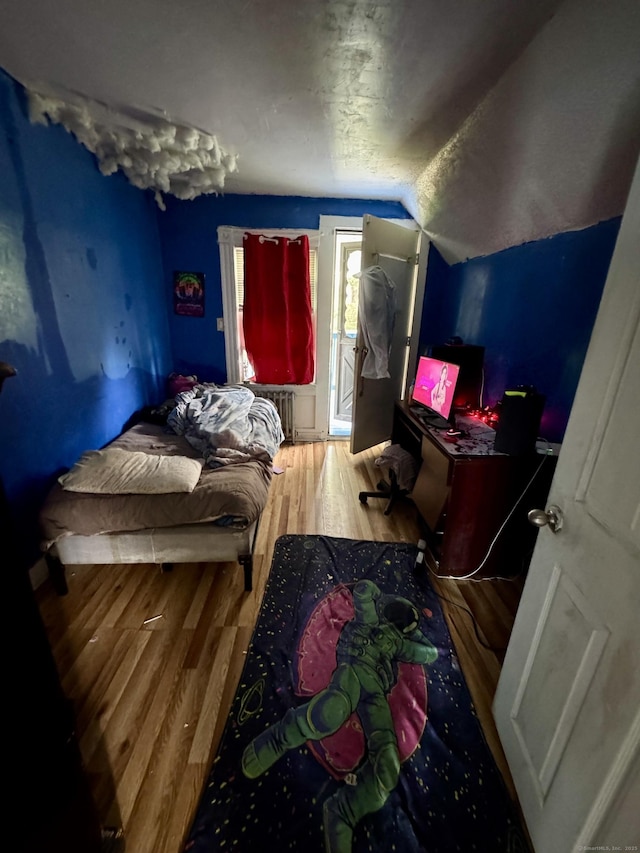81 Easton Ave, Waterbury, CT 06704 - bedroom featuring wood finished floors and lofted ceiling