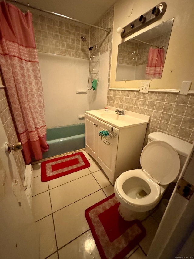 81 Easton Ave, Waterbury, CT 06704 - full bath featuring tile walls, shower / tub combo, vanity, and tile patterned flooring