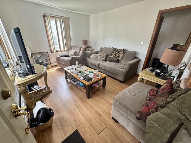 111 Hollywood Ave, Bridgeport, CT 06606 - living room featuring light wood-type flooring and a baseboard radiator