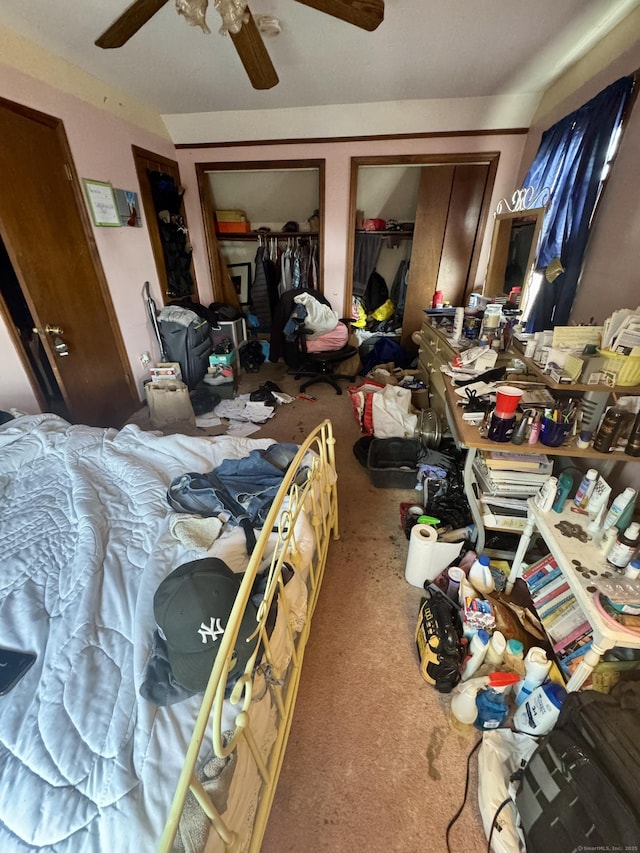111 Hollywood Ave, Bridgeport, CT 06606 - carpeted bedroom featuring a ceiling fan and multiple closets