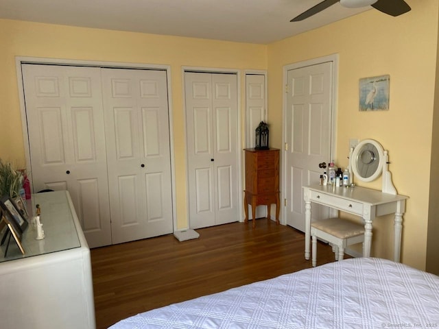 175 W Walk Unit 175, West Haven, CT 06516 - bedroom featuring dark wood-style flooring and multiple closets