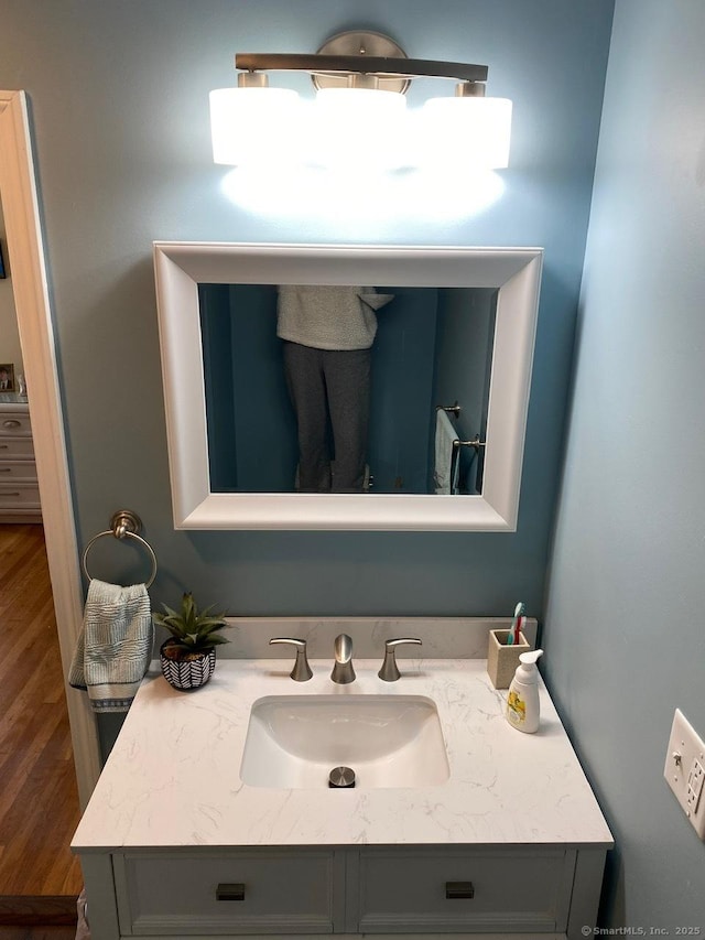 175 W Walk Unit 175, West Haven, CT 06516 - bathroom featuring vanity and wood finished floors
