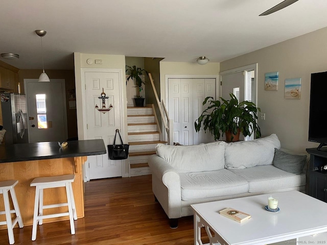 175 W Walk Unit 175, West Haven, CT 06516 - living room featuring dark wood-style floors, stairs, and a ceiling fan
