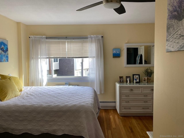 175 W Walk Unit 175, West Haven, CT 06516 - bedroom with a baseboard heating unit, wood finished floors, and a ceiling fan