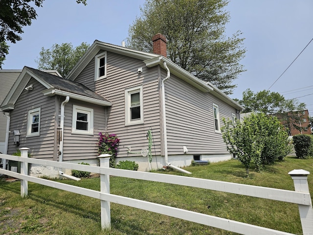 346 Pine St, Bristol, CT 06010 - view of home's exterior with a chimney