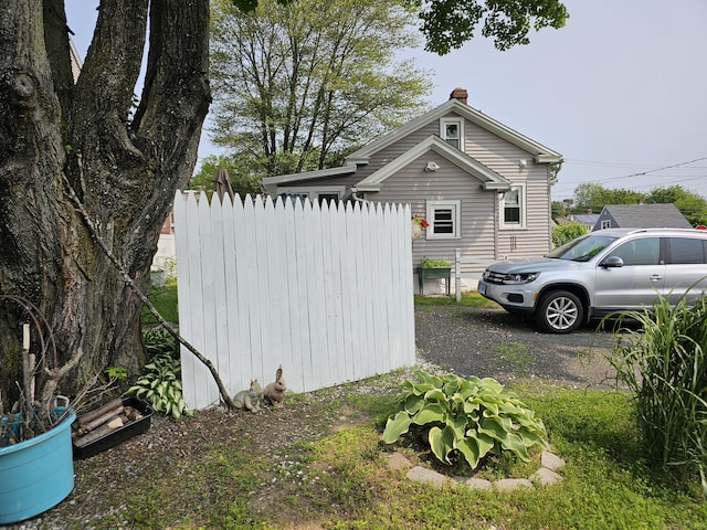 346 Pine St, Bristol, CT 06010 - view of side of property with a chimney
