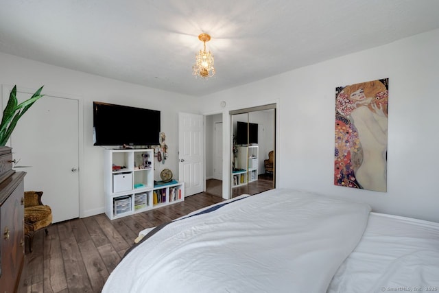 385 Blatchley Ave, New Haven, CT 06513 - bedroom with wood finished floors, a chandelier, and a closet