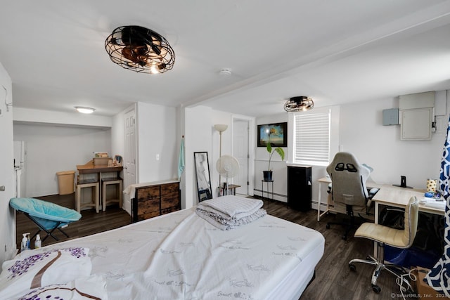 385 Blatchley Ave, New Haven, CT 06513 - bedroom with dark wood finished floors, a desk, and a baseboard radiator