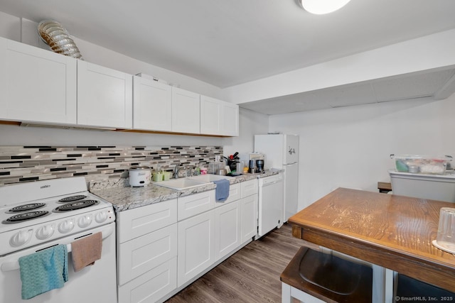 385 Blatchley Ave, New Haven, CT 06513 - kitchen with white appliances, dark wood-style floors, backsplash, and white cabinets