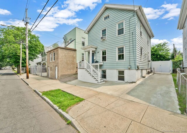 385 Blatchley Ave, New Haven, CT 06513 - view of front of property with a gate