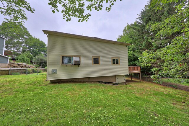 24 Cadbury Pl, Naugatuck, CT 06770 - back of property with a wooden deck and cooling unit